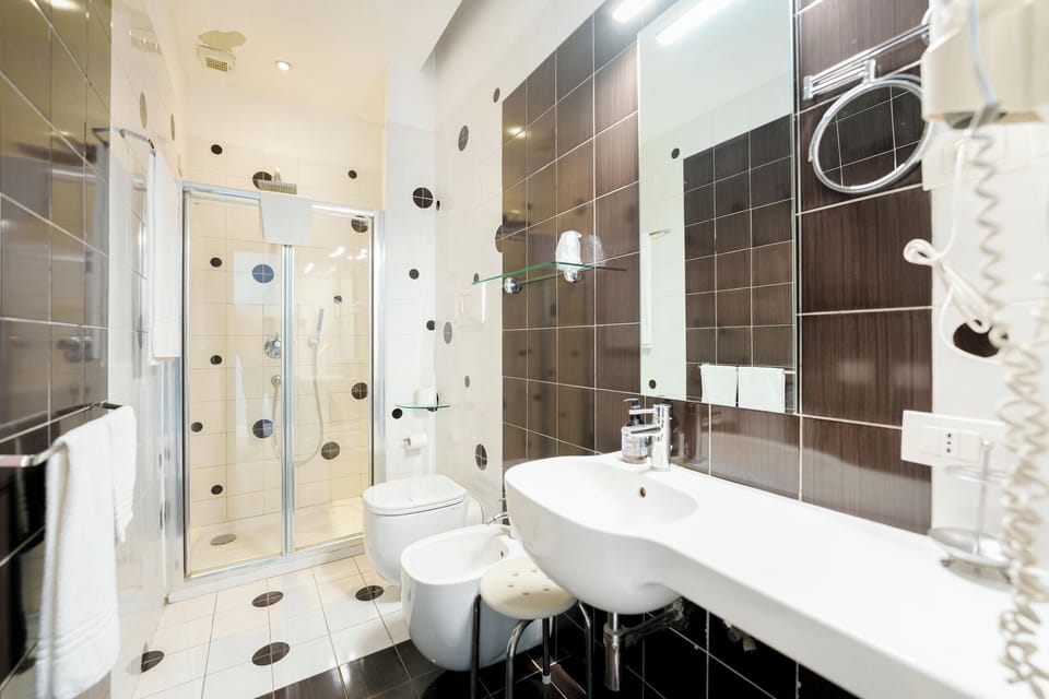 Standard Double or Twin Room | Bathroom | Shower, free toiletries, hair dryer, slippers