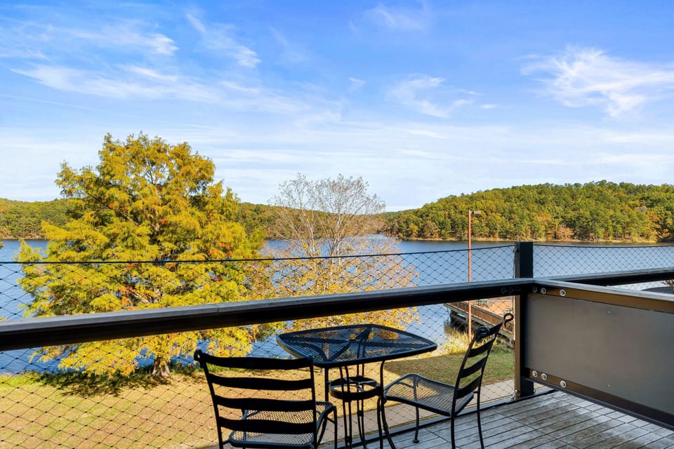 Enjoy your private balcony with stunning lakefront scenery—ideal for morning coffee or evening relaxation.
