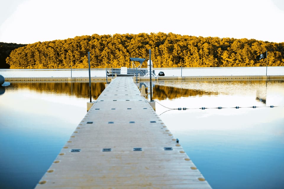 A scenic dock extending into Sunnen Lake, perfect for peaceful mornings and breathtaking sunsets.