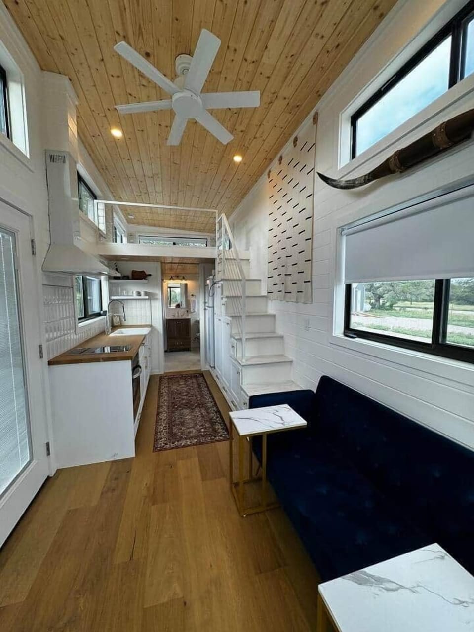 Texas glampgrounds blue moon tiny home interior living kitchen loft