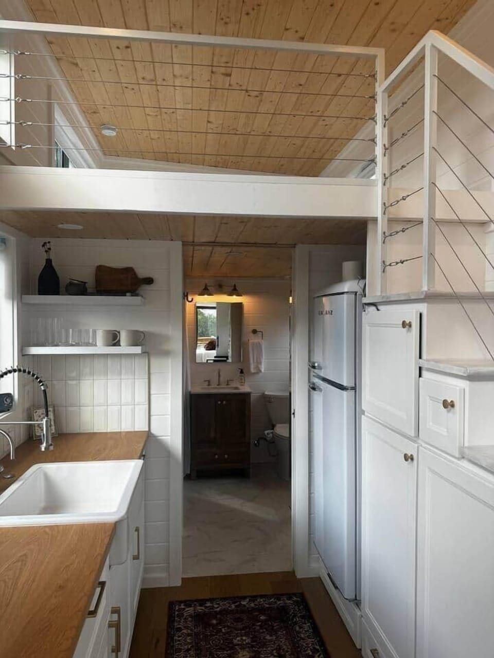 Texas glampgrounds blue moon tiny home kitchen bathroom view