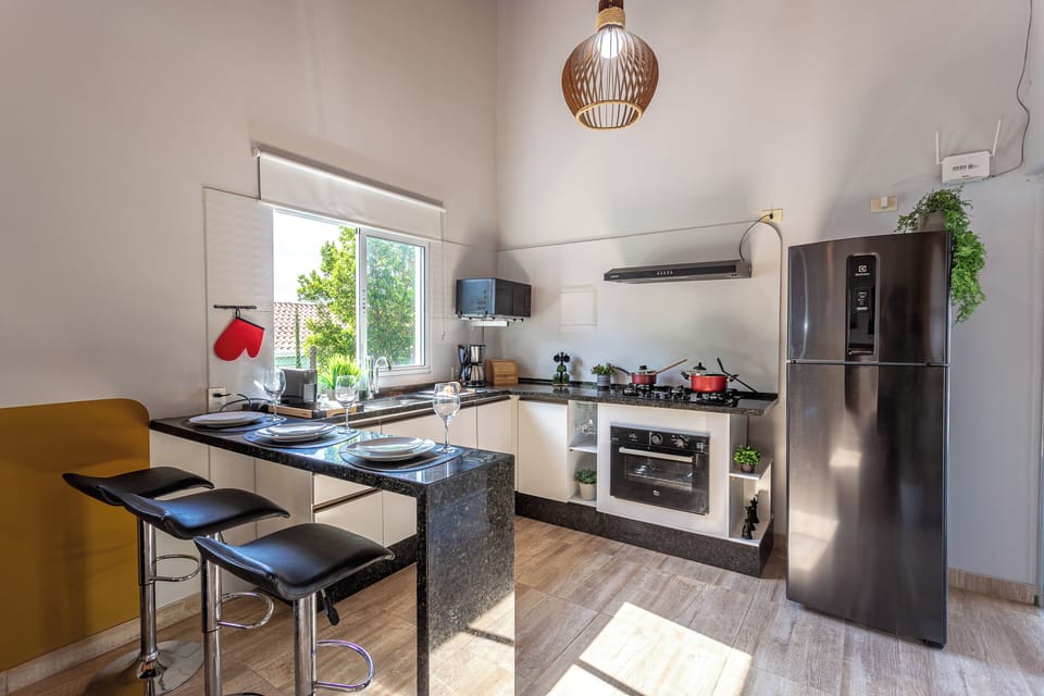 Villa | Private kitchen | Cookware/dishes/utensils, dining tables