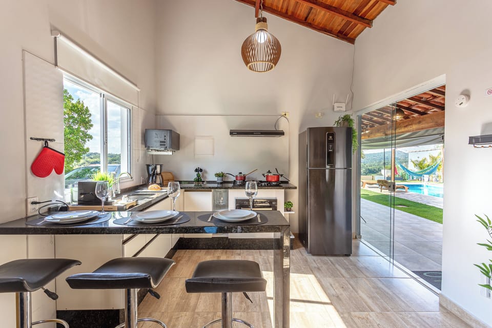 Villa | Private kitchen | Cookware/dishes/utensils, dining tables