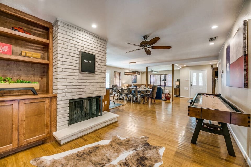 Ceiling Fans in every room and split zone central AC and Heat. You will not be hot or cold no matter what the temperature is outside.