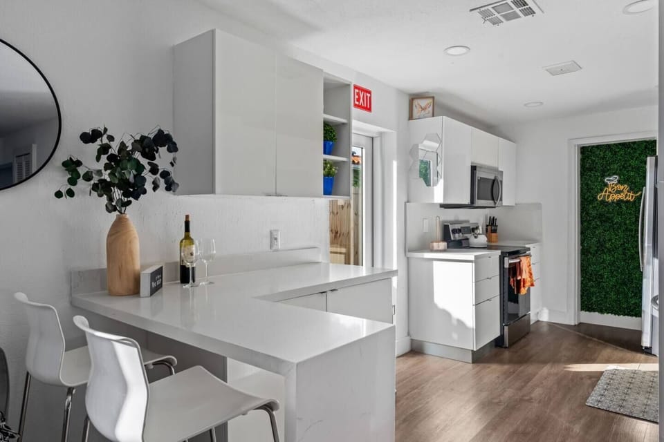 Whip up your favorite meals in this charming  kitchen, designed with modern touches.