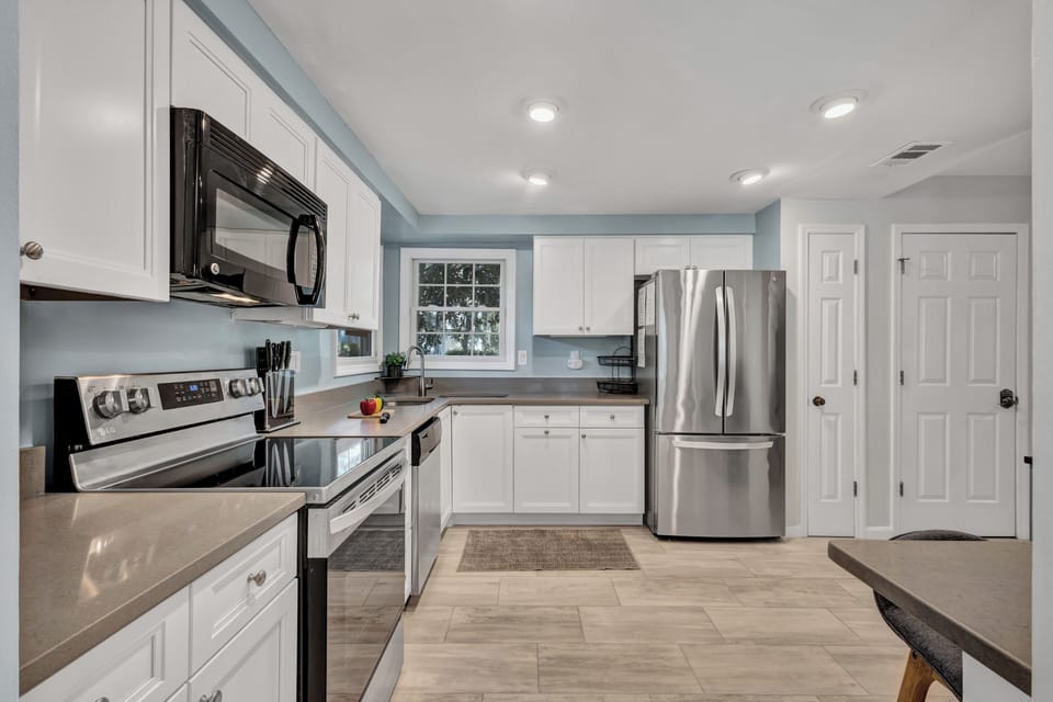 Feel at home in this charming space, where comfort meets a touch of vacation bliss.