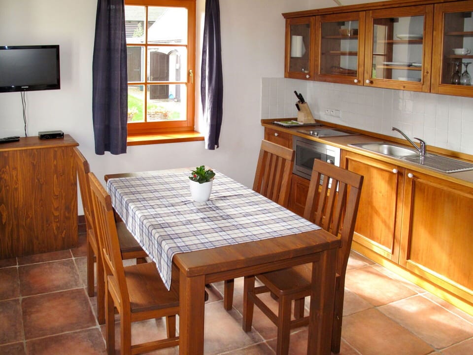 Table, Furniture, Cabinetry, Window, Wood, Tableware, Chair, Kitchen, Interior Design, Lighting
