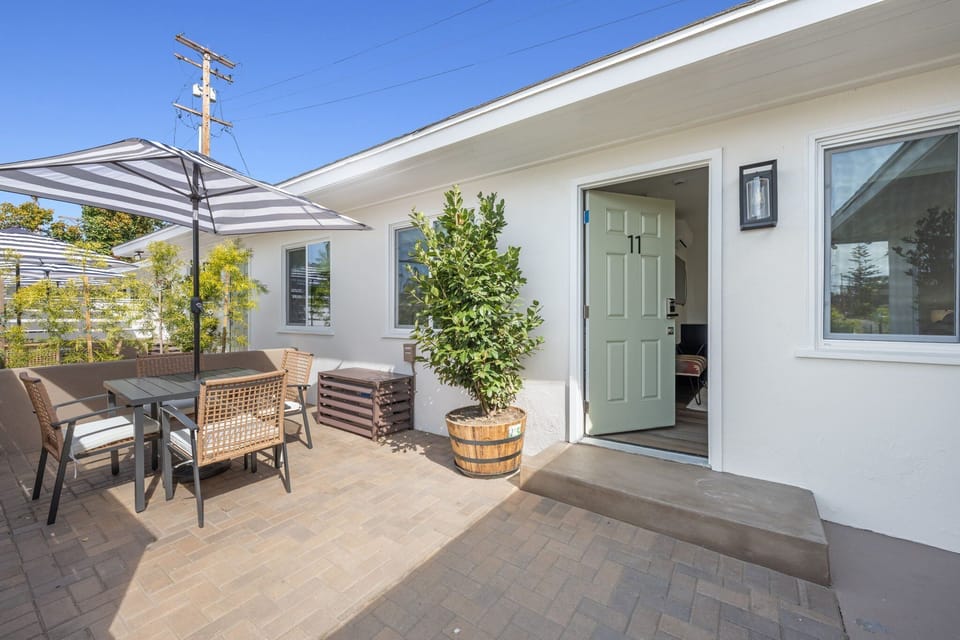 Experience your semi-private patio, featuring a table and four chairs, and ideal for basking in the sun while enjoying your morning coffee.