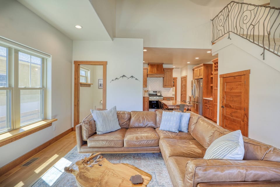 Large oversized leather sofa in main living space.