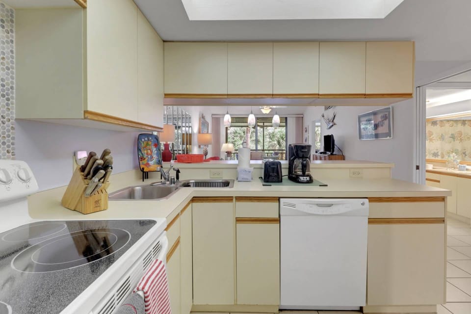 Cookware, dinnerware, kitchen tools and small appliances are provided for your use, including a drip and Keurig-style coffee maker.