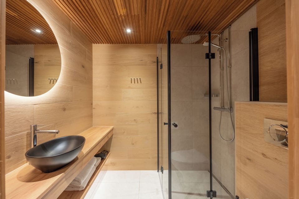 Superior Quadruple Room | Bathroom | Shower, hair dryer, towels, soap