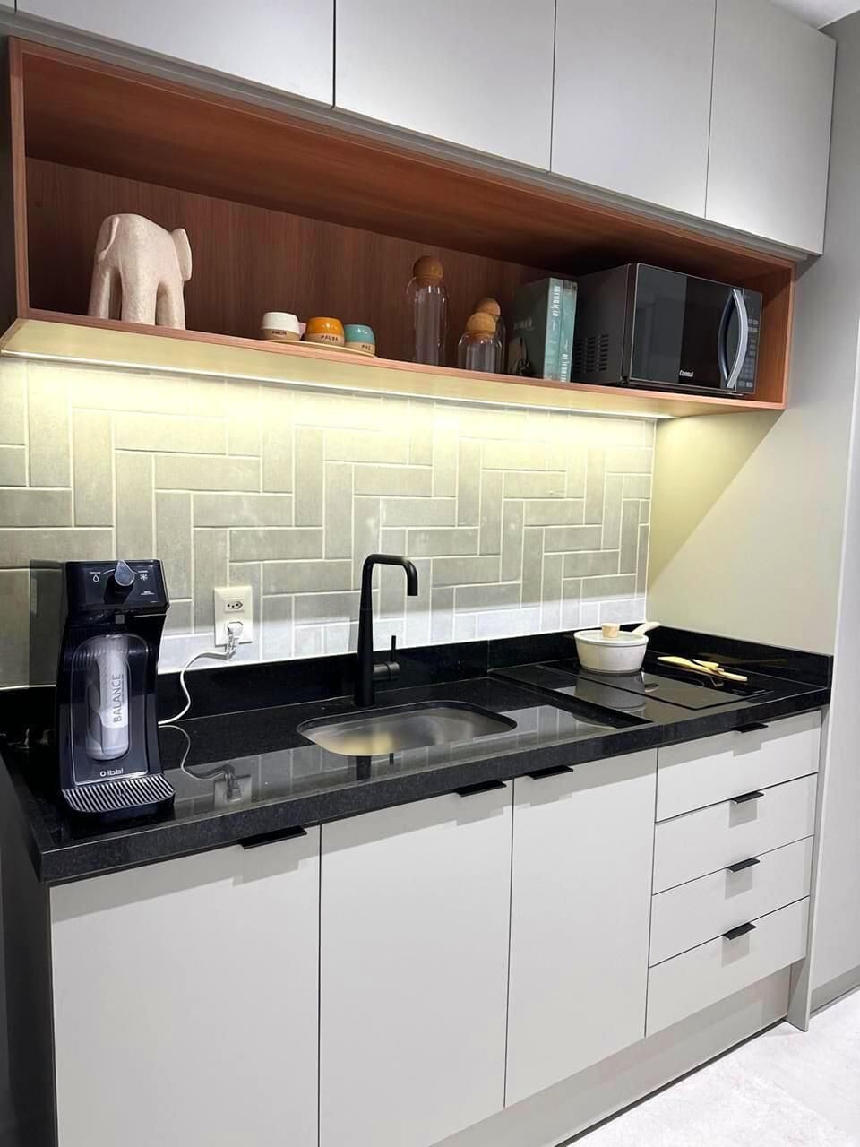 Deluxe Studio Suite, Balcony, Pool View | Private kitchen | Full-size fridge, microwave, oven, stovetop