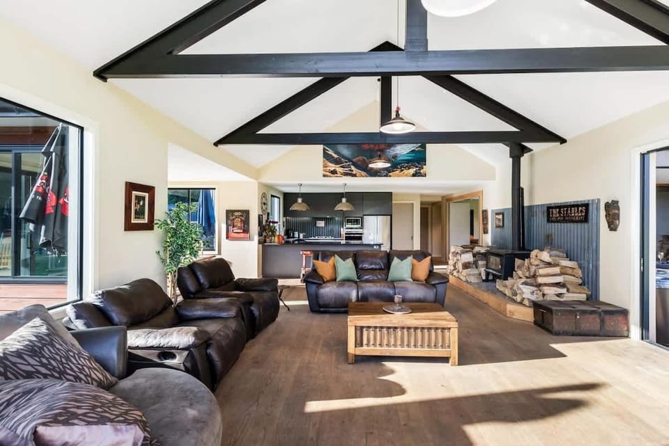 Spacious entertainment lounge, with 360 degree views of the surrounding mountains. Open flow dining area, kitchen and private patio area with private seating, children's play areas and BBQ.