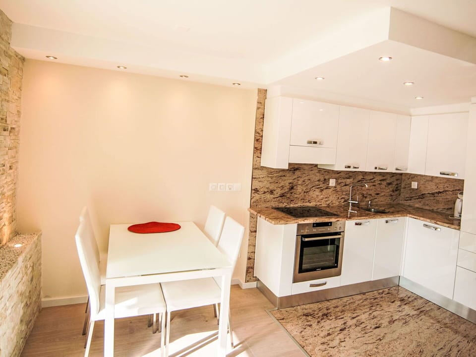 Furniture, Interior Design, Flooring, Floor, Wood, Ceiling, Room, Lighting, Countertop, Kitchen