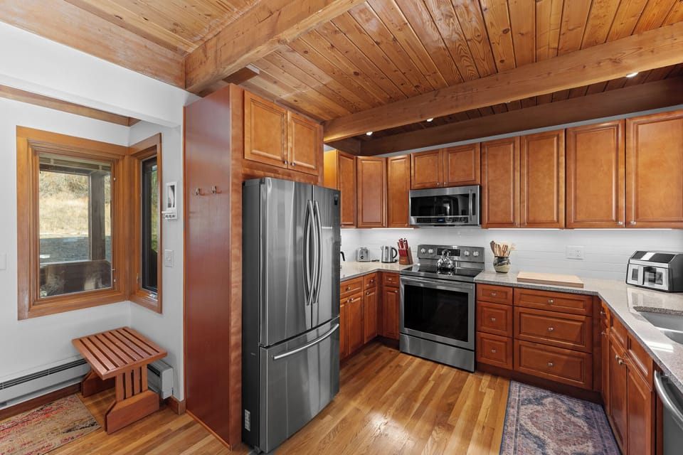 Cook your favorite meals in this fully equipped kitchen with stainless steel appliances, granite countertops, and plenty of cabinet space for all your vacation essentials.