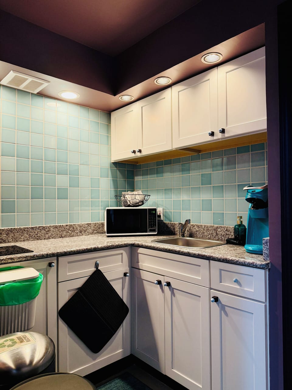 Kitchenette offers Kuerig (w/pods!), microwave, single burner, dishes, utensils.