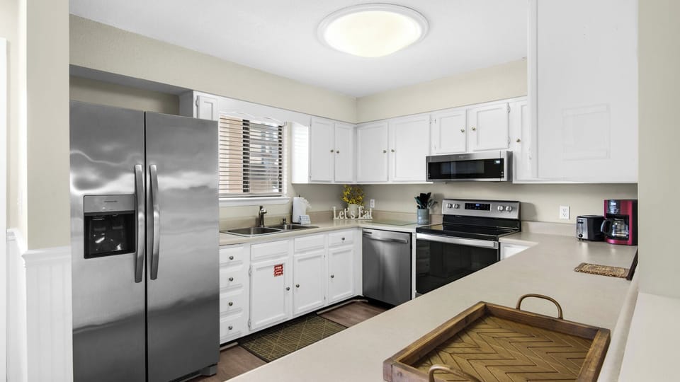 Condo, Multiple Beds, Patio, Garden View (Chateau La Mer II 902) | Private kitchen | Fridge, microwave, oven, stovetop