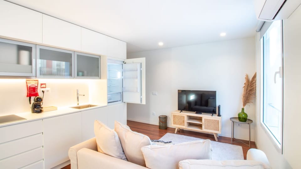 Sleek, fully equipped kitchen blending seamlessly into the lounge — perfect for relaxed mornings or easy nights in. #ModernKitchen #OpenConcept #ComfortAndStyle