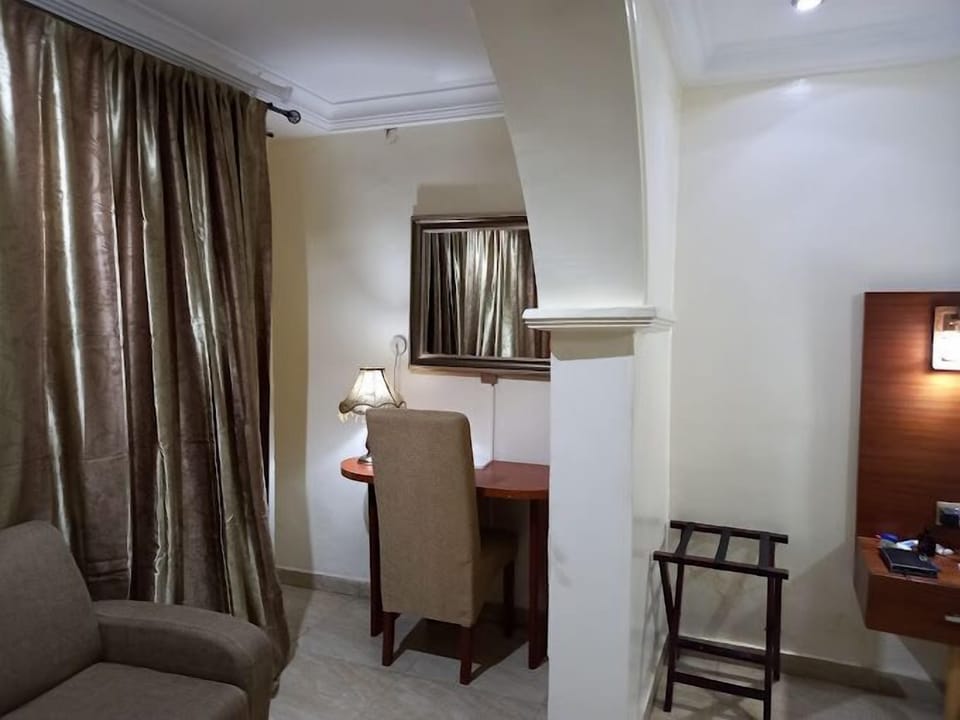 Deluxe Room, Balcony, City View | Desk, laptop workspace, blackout drapes, soundproofing