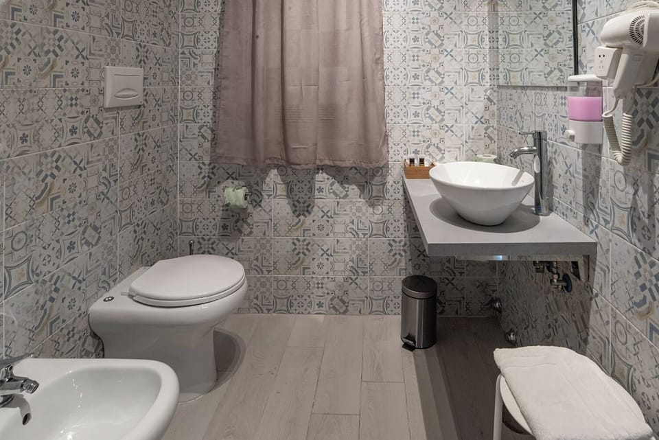 Superior Room, Sea View | Bathroom | Shower, hair dryer, towels, soap