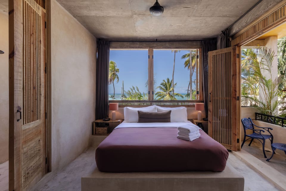 Oceanside Rooftop Terrace Suite | Premium bedding, in-room safe, laptop workspace, iron/ironing board