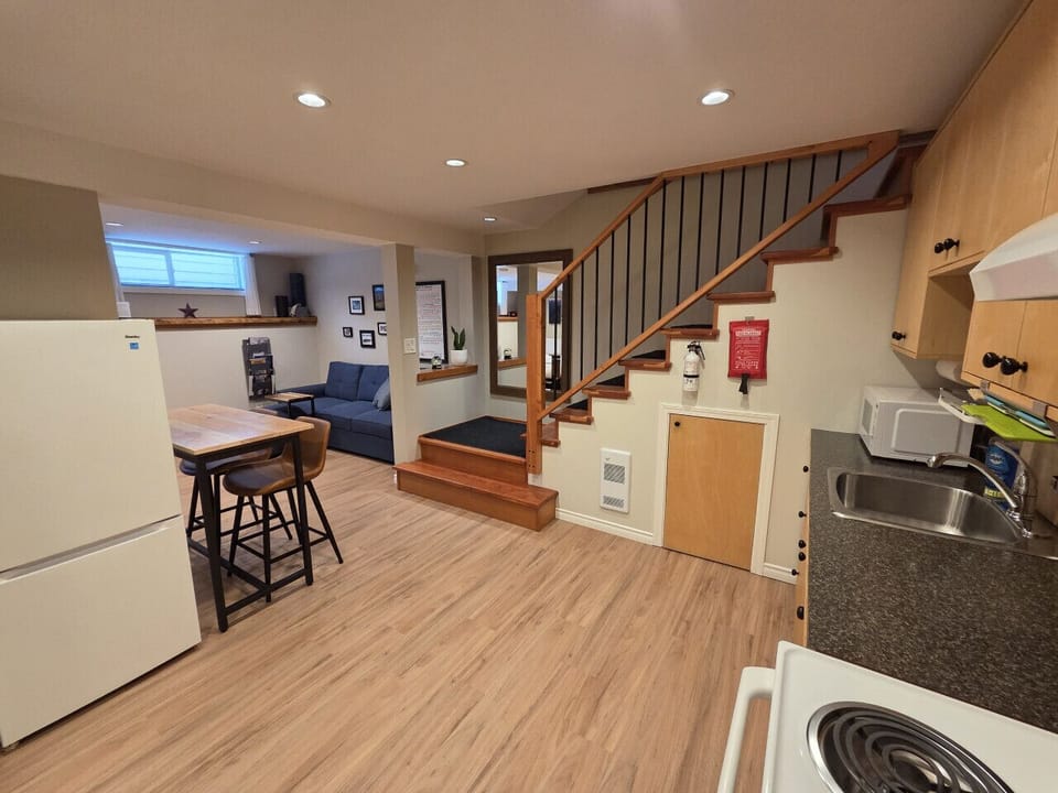 Fully stocked kitchen with fridge, freezer, stove, oven, slow cooker, microwave etc.