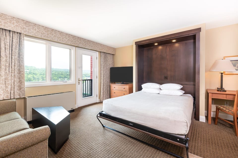 Comfortable bedroom with cozy decor and a calming atmosphere, perfect for winding down after a busy day.