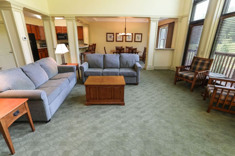 Spacious and inviting living area with plush seating, perfect for relaxing or gathering with loved ones.
