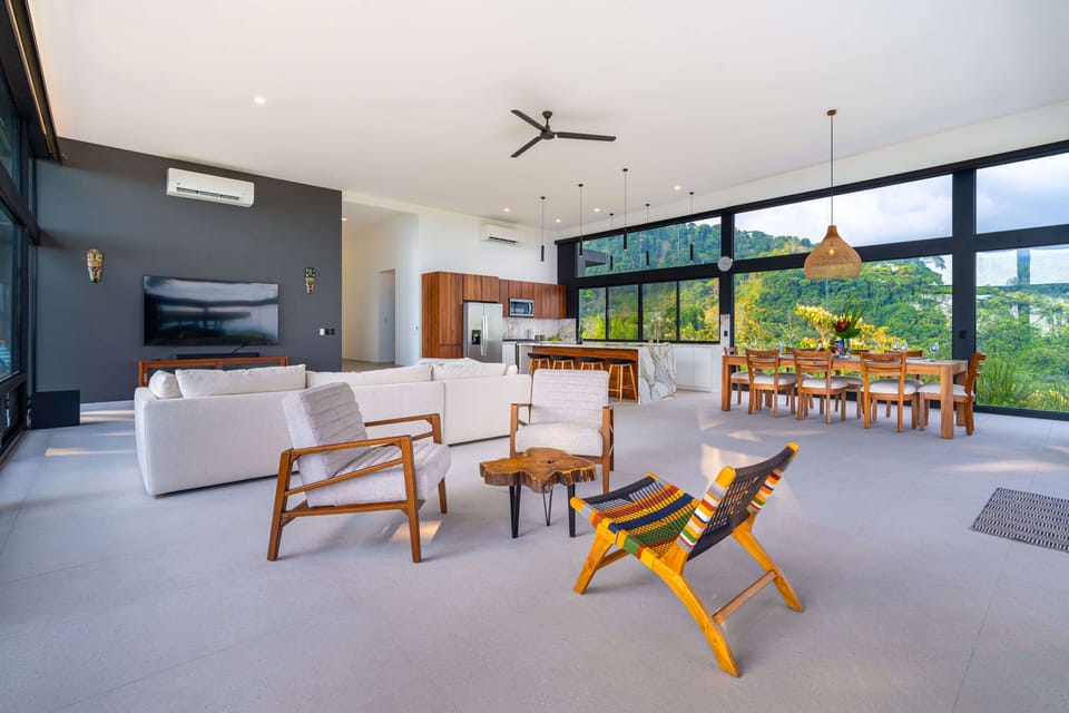 Spacious and open floorplan with floor-to-ceiling windows providing spectacular views from inside. 