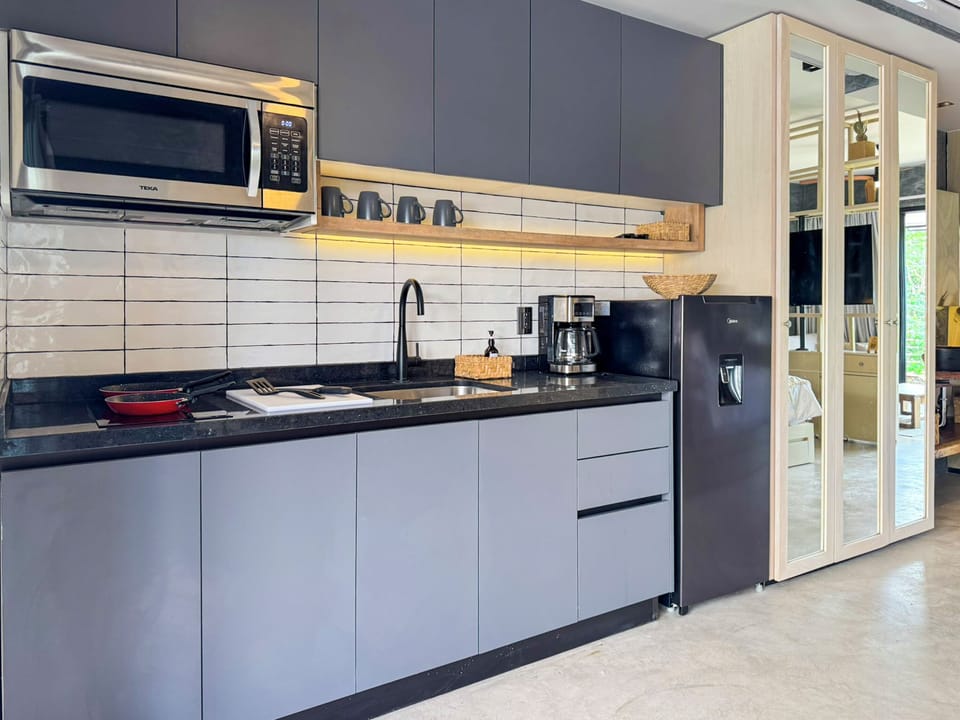 Fridge, microwave, stovetop, cookware/dishes/utensils
