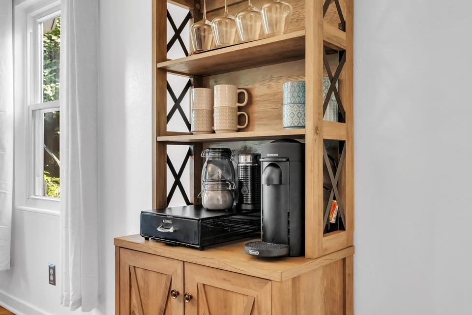 Nespresso Coffee and wine bar with wine rack—ideal for post-game celebrations

