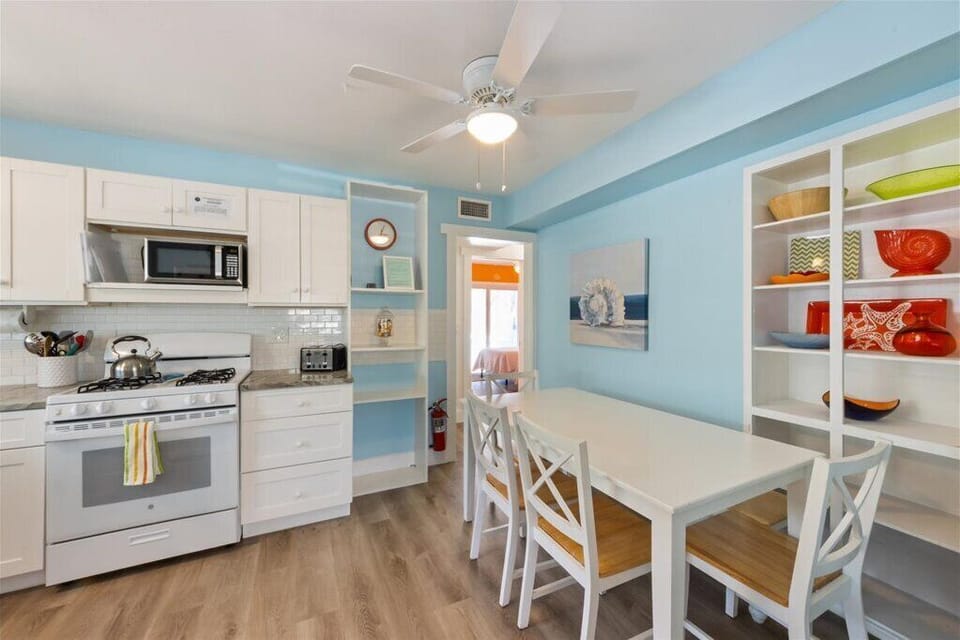 Savor your seaside meals in this charming dining nook.