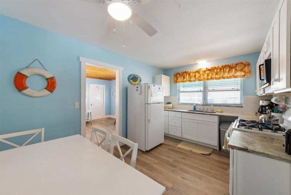 Fuel your beach days with easy meals in this bright kitchen.