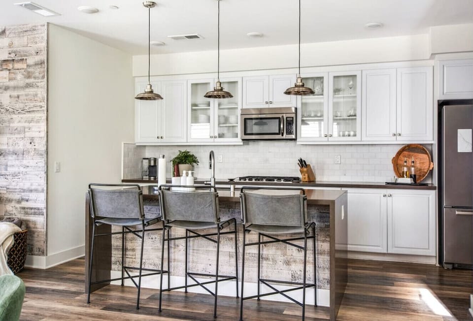 3 barstools at the kitchen counter