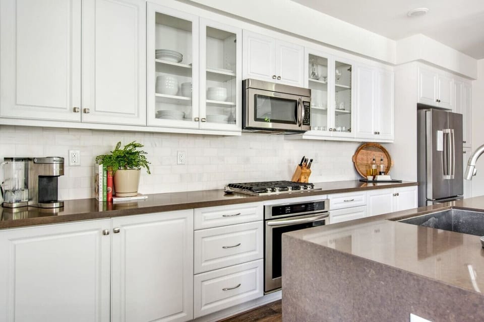 Fully stocked kitchen with cooking utensils