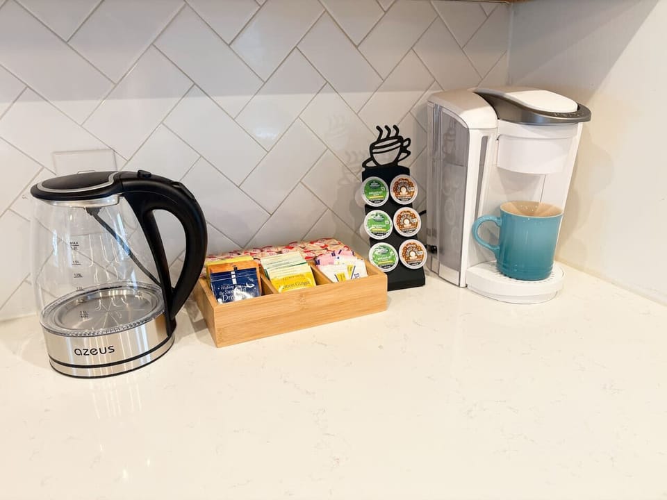 Start your morning right with a Keurig, electric kettle, and a whole tea and coffee bar stocked for however you take yours