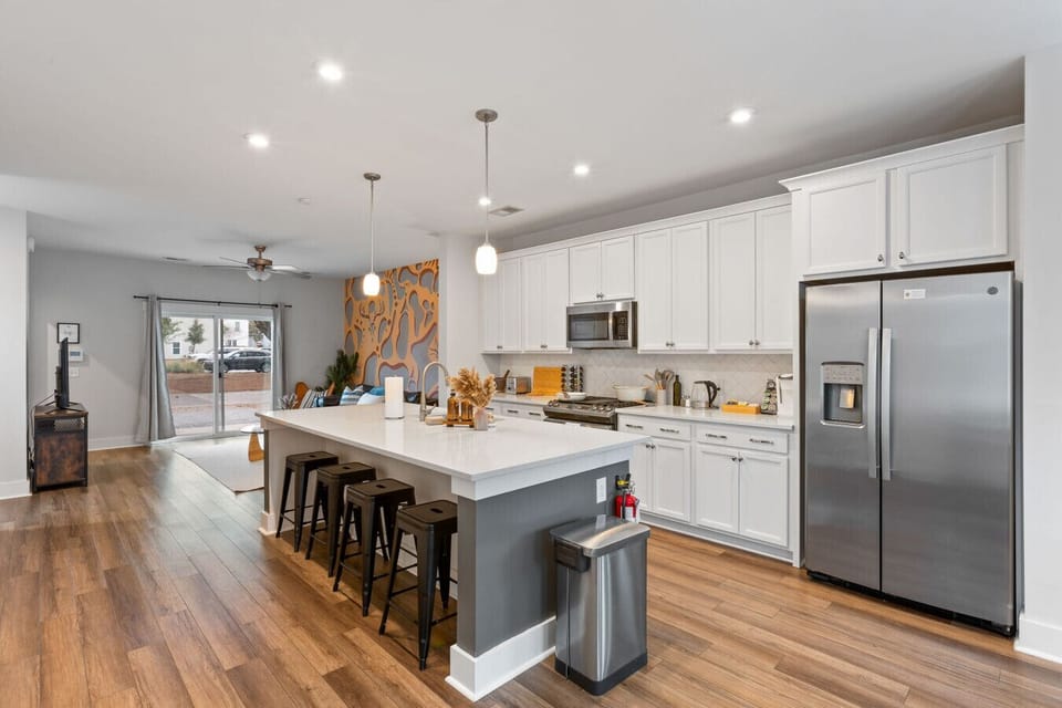 Pull up a stool at the island and plan your Park Circle adventures - this kitchen has plenty of counter space for morning coffee or cooking dinner together