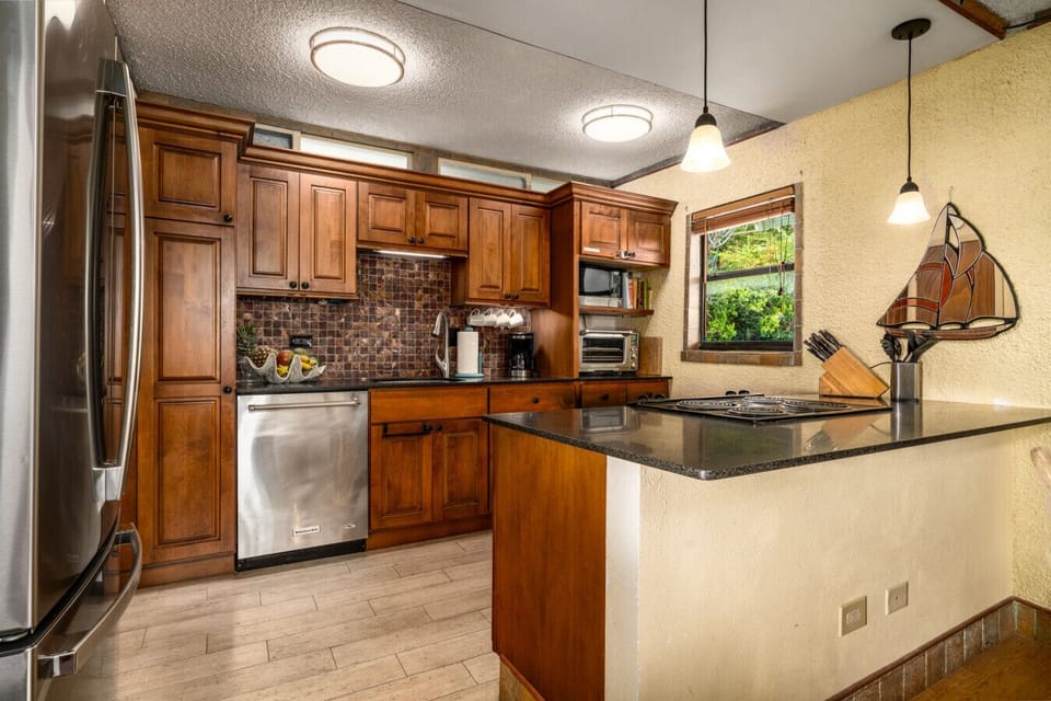 Spacious, well-appointed kitchen.