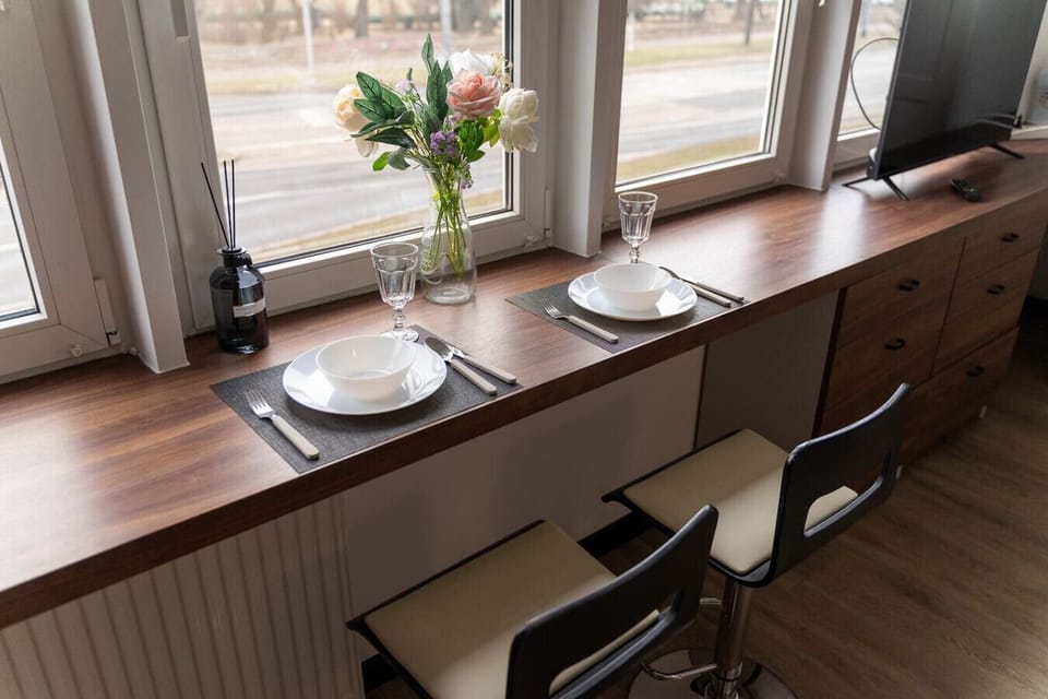 Dining Area with a Stunning National Stadium View | Book Now with RENTUJEMY.COM