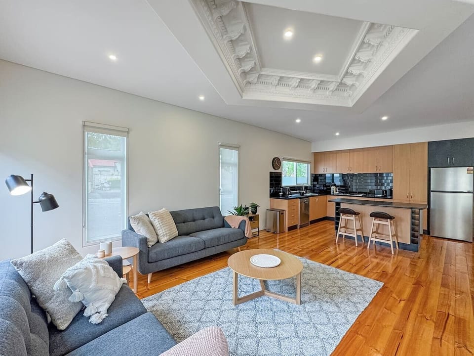 Living area with comfortable couches to seat 4 guests