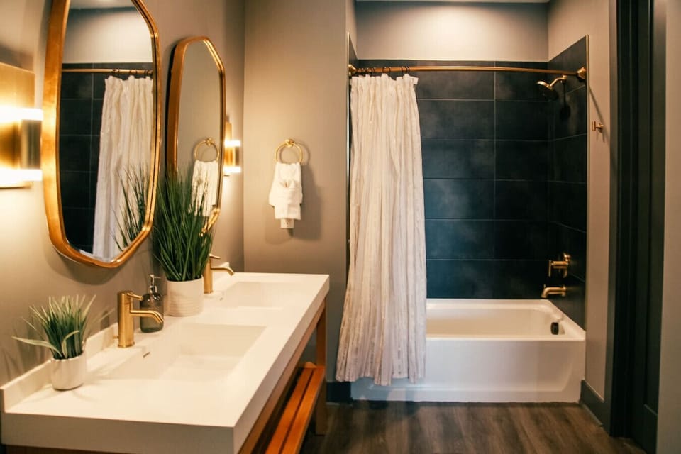 Bathroom with double vanity and walk in shower