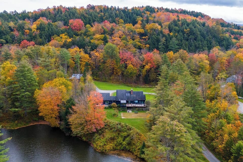 Aerial of the property overlooking the pond with the 2bdrm apt being on the left side of the image. 