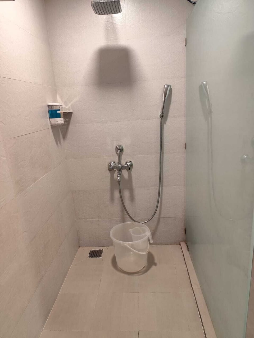 Shower, slippers, towels, soap