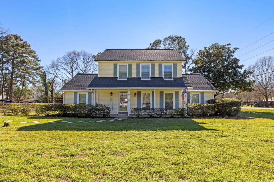 Charming home with spacious yard and classic curb appeal
