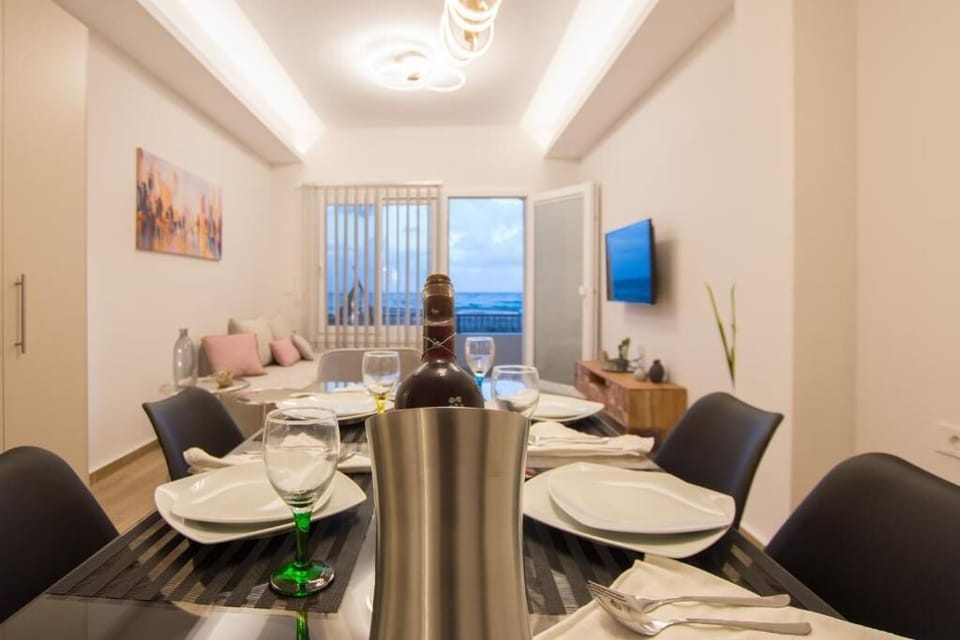 Superior Apartment, Partial Sea View | Living area | Flat-screen TV