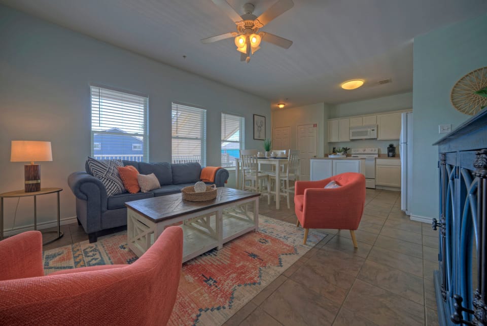 Living room featuring a TV and a comfortable sleeper sofa for additional sleeping space. (Costa Bahia 208)