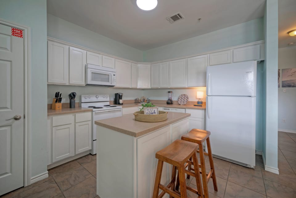 Upgrade your breakfast experience with the barstool seating. (Costa Bahia 207)