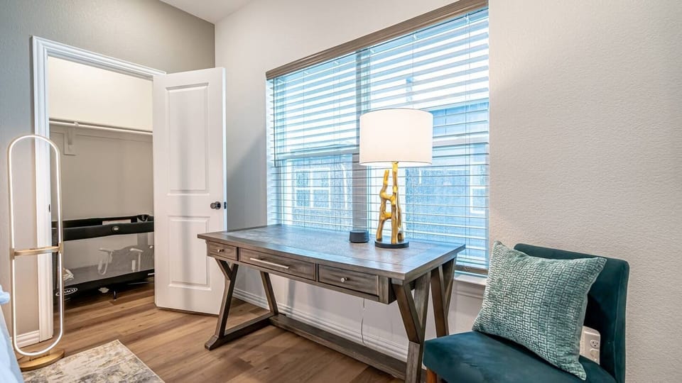 Enjoy the convenience of this workspace located in the main bedroom.