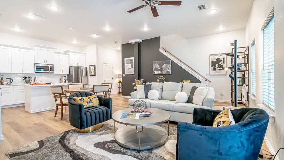 Kick back in a stylish, open-concept living space designed for comfort and connection. Whether you're debriefing after a Rangers game, watching pre-game coverage on the smart TV or just relaxing with your crew—The Ryan's living area has you covered.