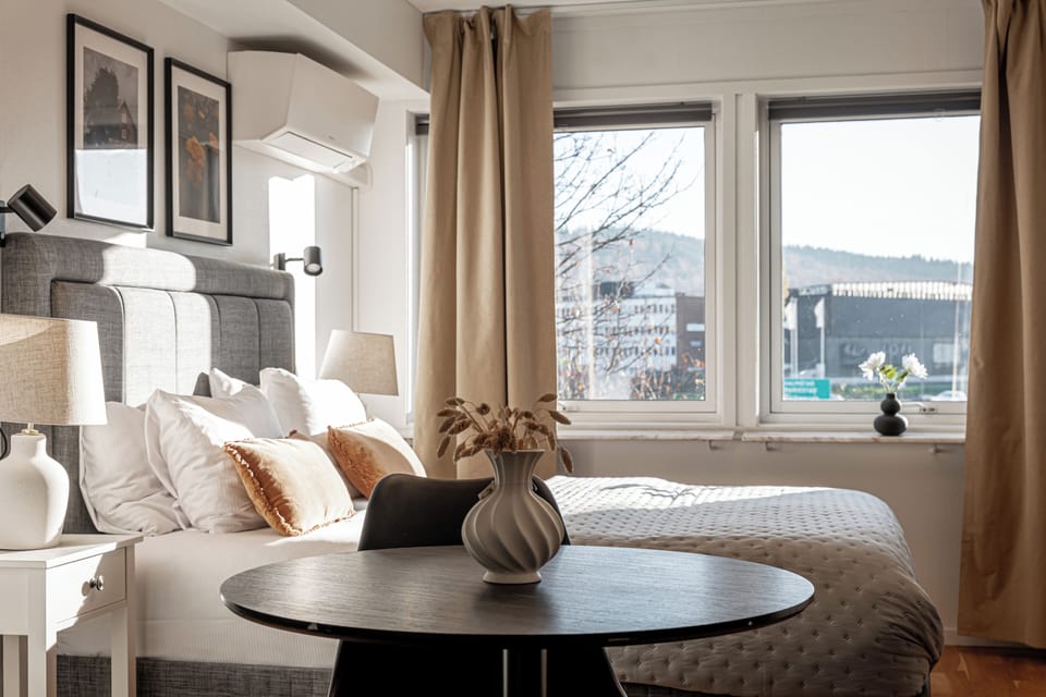Classic Double Room | Living area | 32-inch LCD TV with cable channels